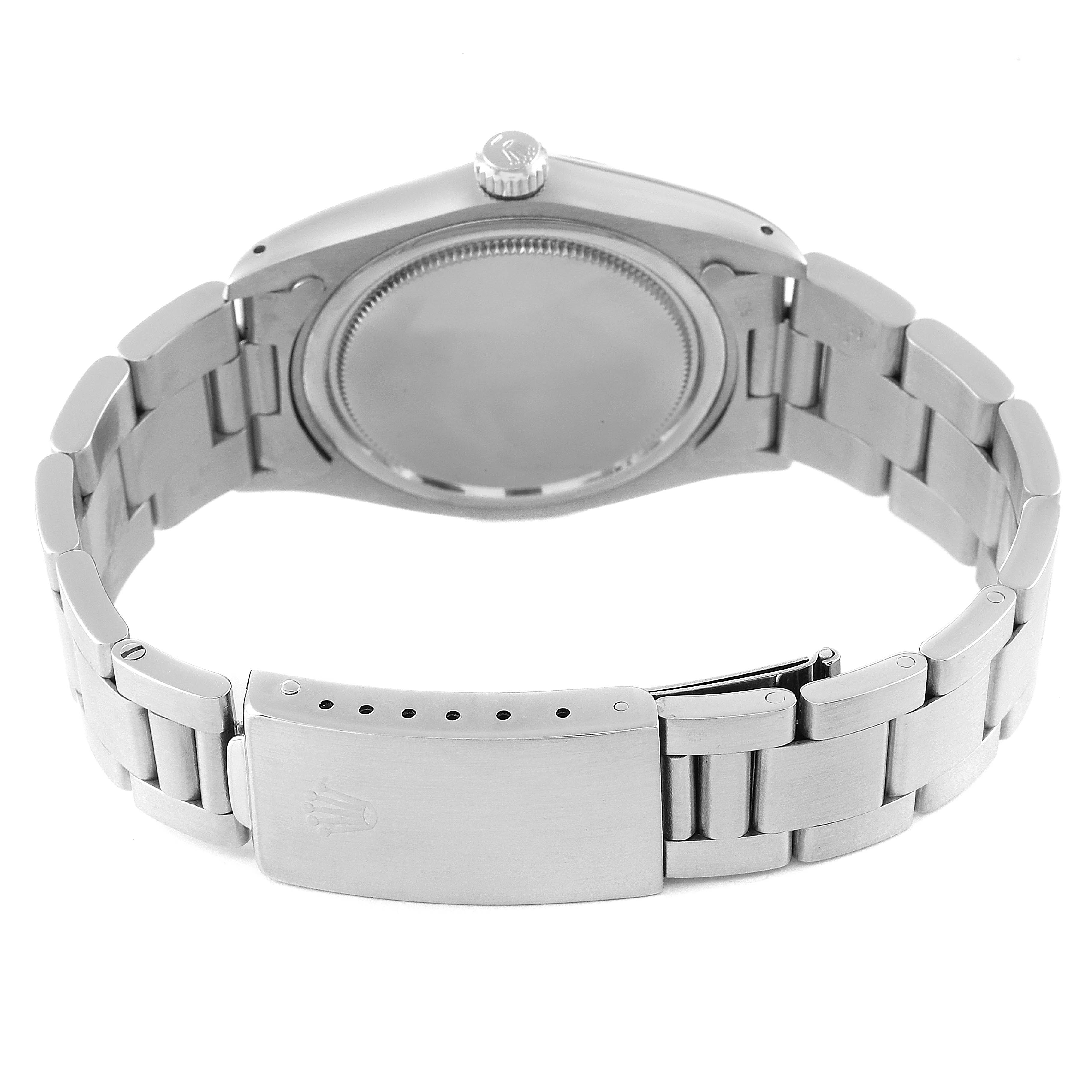 The image shows the back of the Rolex Date 6694 Men's Stainless Steel Blue Dial 6694 Men's Stainless Steel Blue Dial model watch, highlighting the case back, bracelet, and clasp.