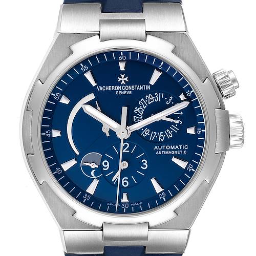 The Vacheron Constantin Overseas 47450/000A.9039 Men's Stainless Steel Blue Dial 47450/000A.9039 Men's Stainless Steel Blue Dial watch is shown from a front angle, displaying its blue dial, three subdials, and silver case.