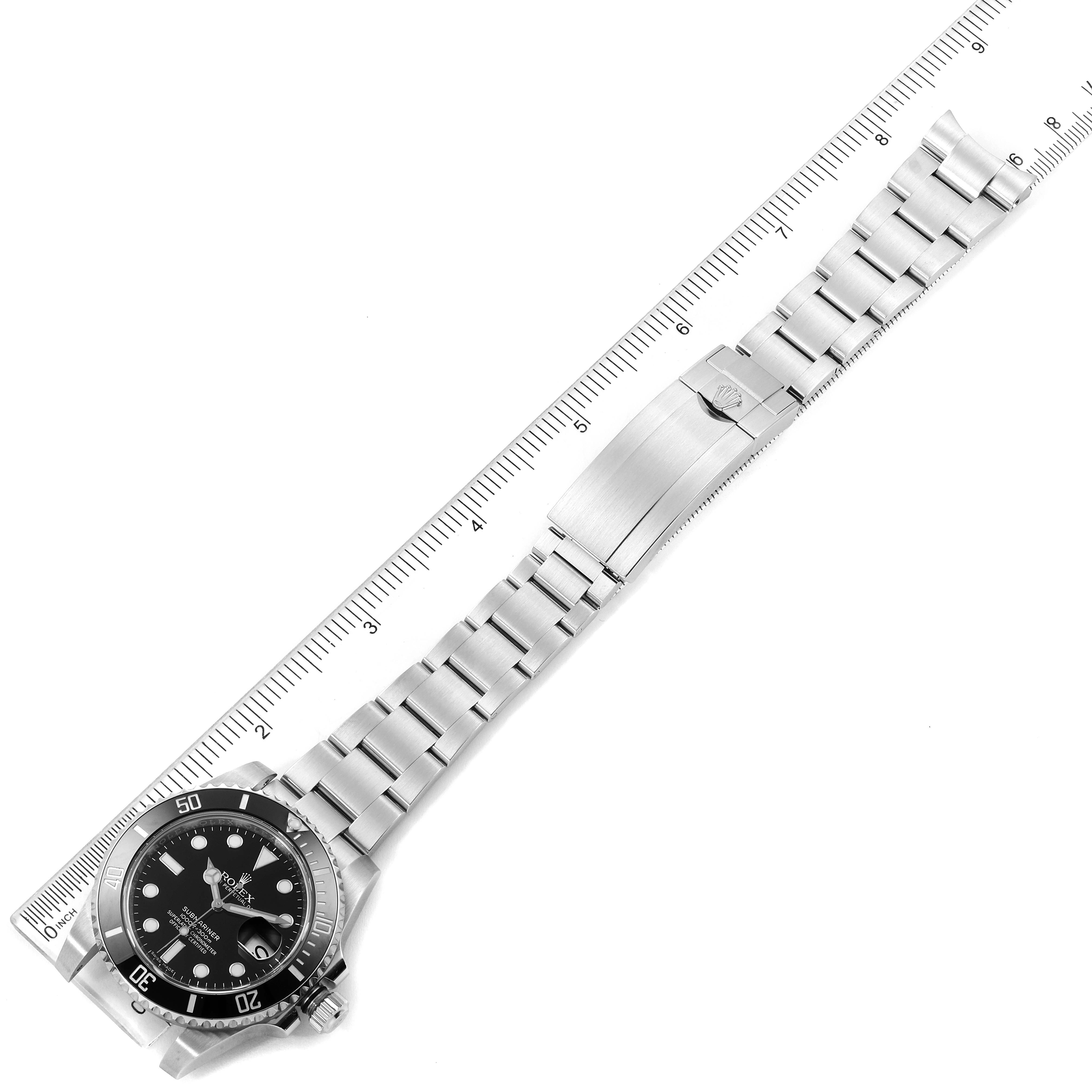 This image shows a Rolex Submariner 116610LN Men's Stainless Steel Black Dial 116610LN Men's Stainless Steel Black Dial watch from a top-down angle, featuring the full bracelet and partially the front face with bezel.