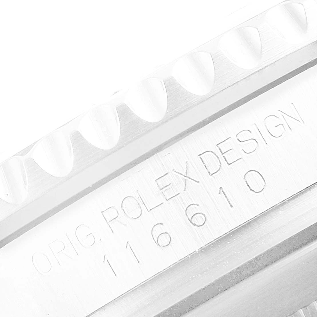 This image shows a close-up angle of the bezel and engraved side of the Rolex Submariner 116610LN Men's Stainless Steel Black Dial 116610LN Men's Stainless Steel Black Dial model 116610 watch.