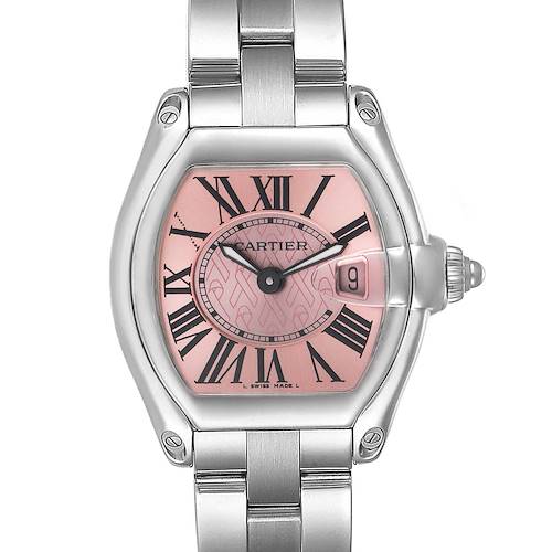 The image shows a top-down view of a Cartier Roadster W62043V3 Women's Stainless Steel Pink Dial W62043V3 Women's Stainless Steel Pink Dial watch, highlighting its pink dial, Roman numerals, and metallic bracelet.