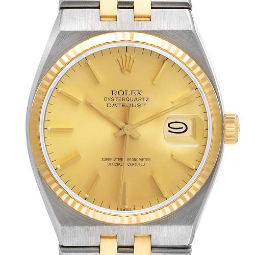 This image shows a front view of the Rolex Oysterquartz 17013 Men's Steel and Gold (two tone) Champagne Dial 17013 Men's Steel and Gold (two tone) Champagne Dial Datejust watch, featuring its dial, bezel, crown, and part of the bracelet.