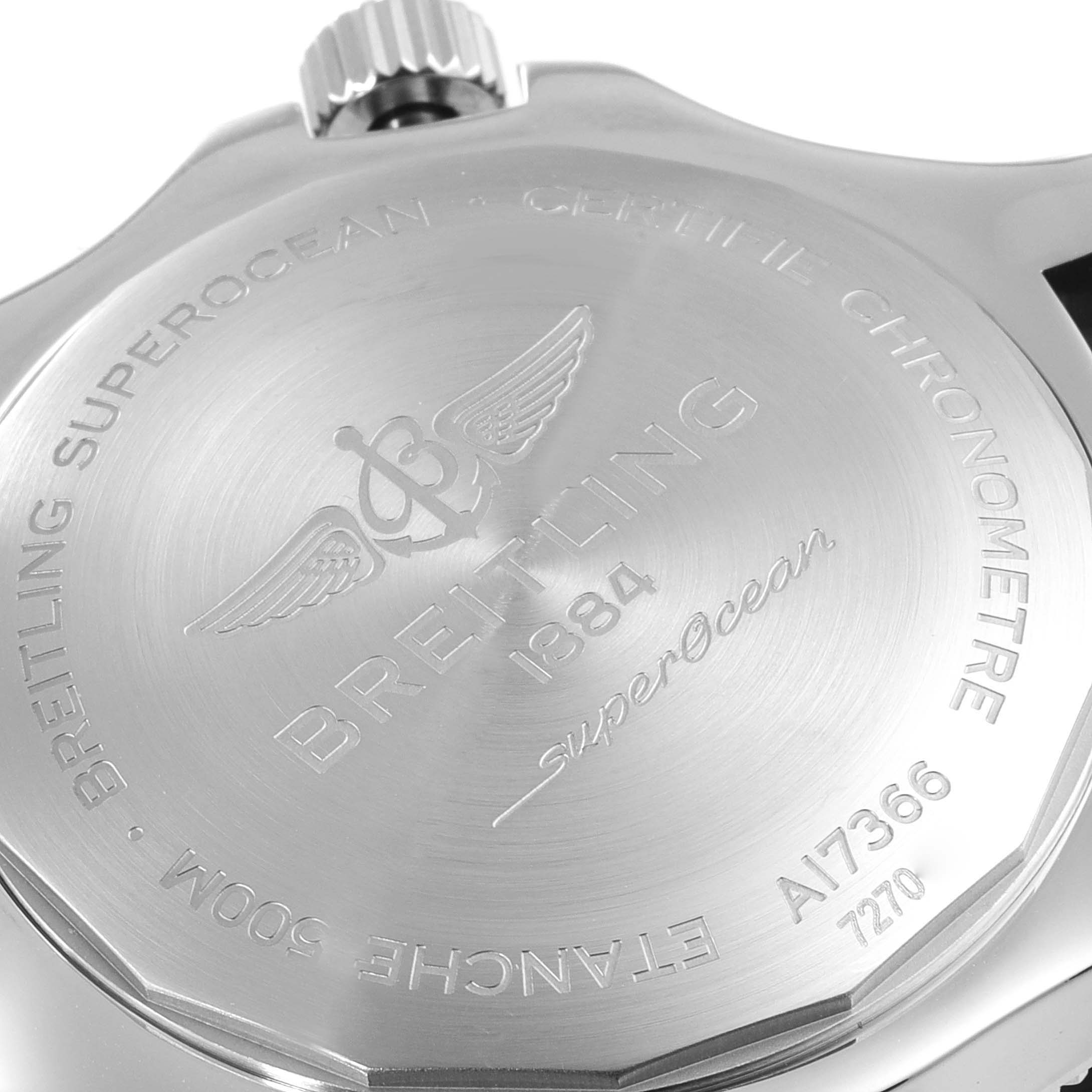 The image shows the back casing of a Breitling Superocean A17366 Men's Stainless Steel White Dial A17366 Men's Stainless Steel White Dial watch, featuring the brand name, model, and additional engravings.
