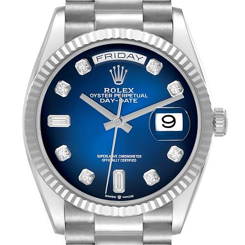 The Rolex President 128239 Men's White Gold Blue Dial 128239 Men's White Gold Blue Dial model is shown from a front angle, displaying its blue dial, fluted bezel, and day-date features.