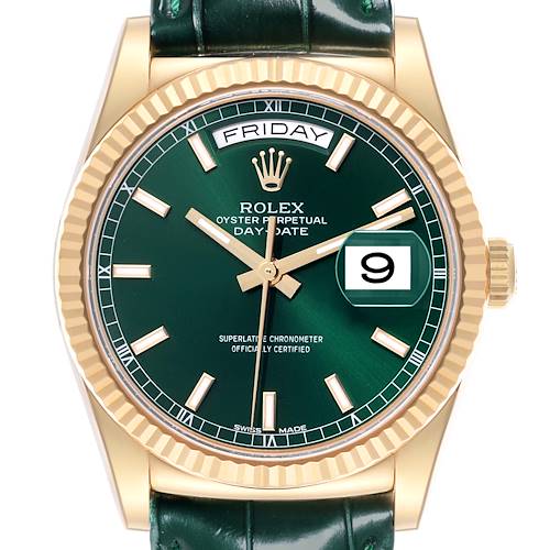 The Rolex President 118138 Men's Yellow Gold Green Dial 118138 Men's Yellow Gold Green Dial model is shown from the front, featuring a green dial, gold hour markers, fluted bezel, and a leather strap.