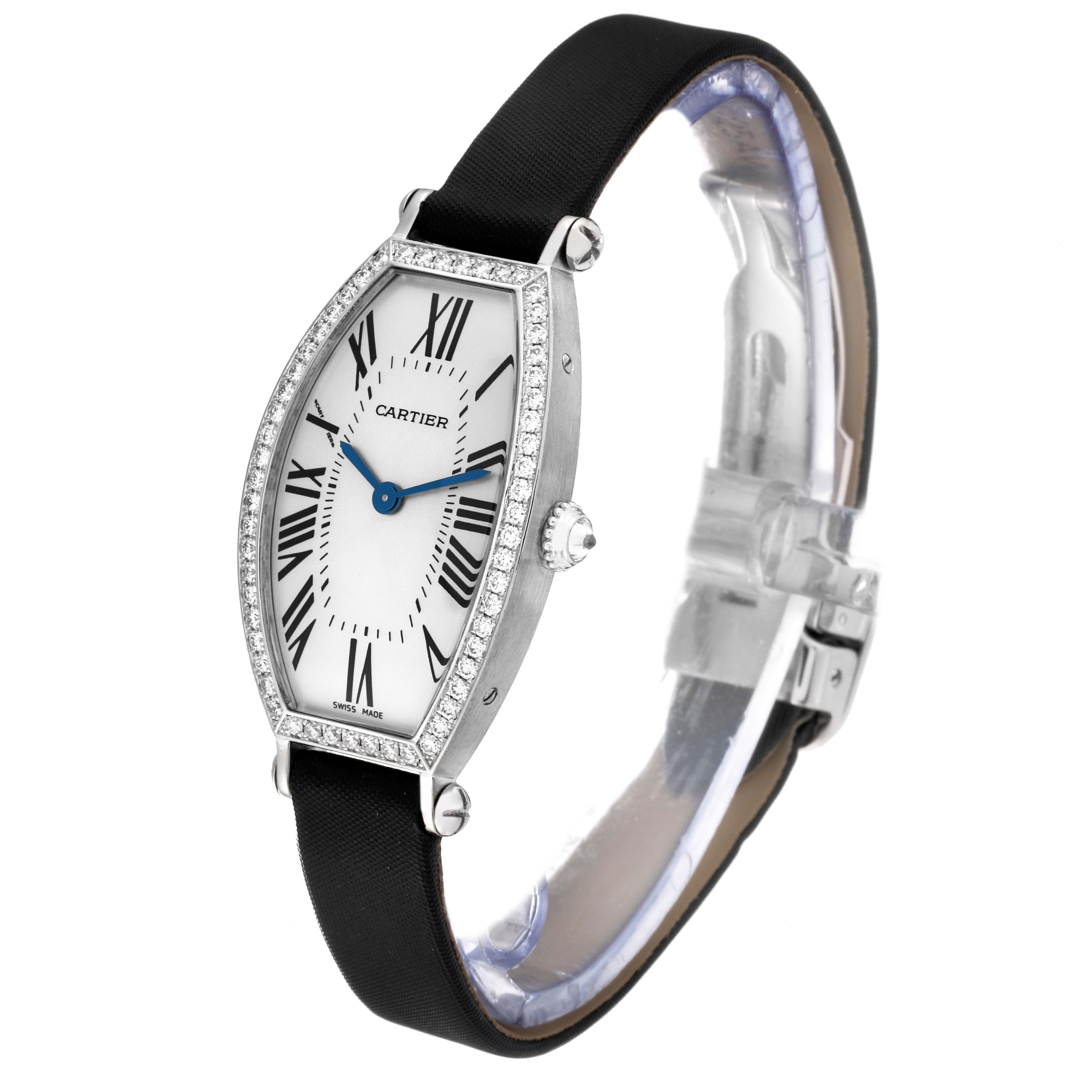 This image shows a Cartier Tonneau WE400131 Women's White Gold Silver Dial WE400131 Women's White Gold Silver Dial watch angled to display its face, crown, strap, and diamond-encrusted bezel.
