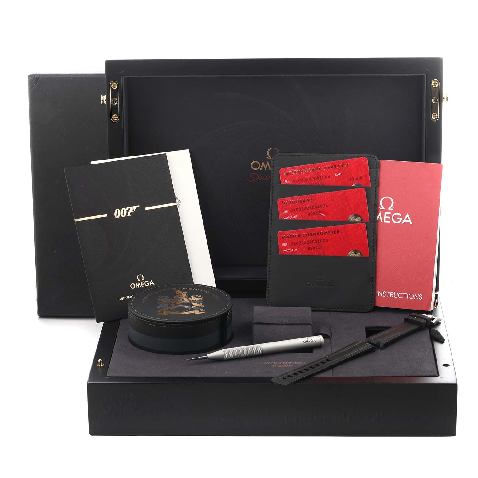 The image shows accessories for the Omega Seamaster 210.22.42.20.01.004 Men's Stainless Steel Black Dial 210.22.42.20.01.004 Men's Stainless Steel Black Dial watch, including a storage box, instruction manuals, cards, a pen, and a strap tool.