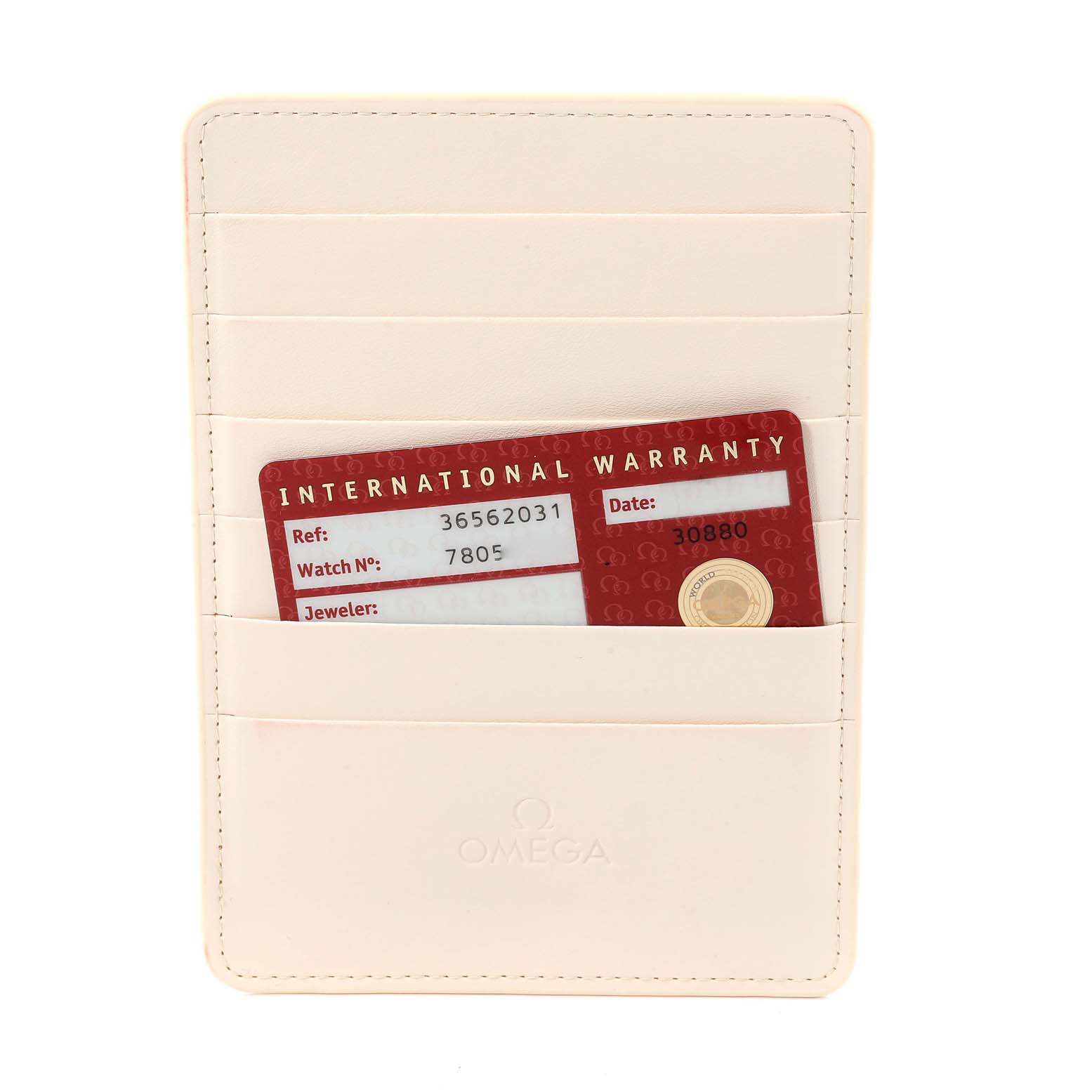 The image shows the international warranty card for the Omega Speedmaster 3656.20.31 Men's Yellow Gold White Dial 3656.20.31 Men's Yellow Gold White Dial model, placed in a light-colored cardholder.