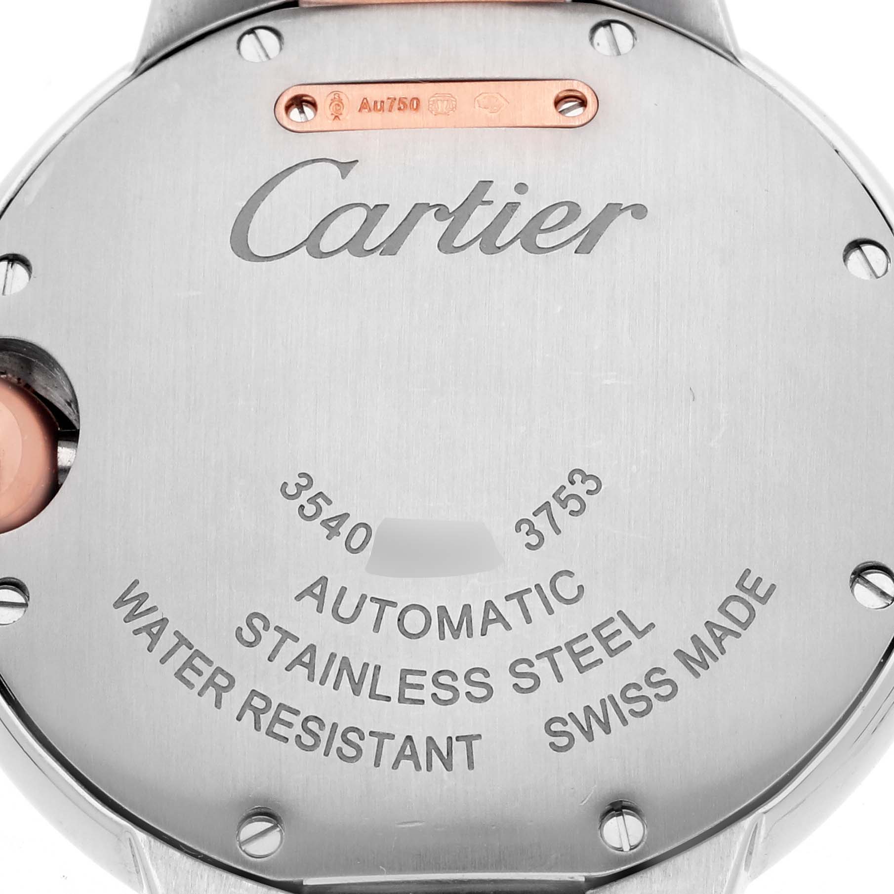 The image shows the back of a Cartier Ballon Bleu WE902077 Women's Steel and Gold (two tone) Silver Dial WE902077 Women's Steel and Gold (two tone) Silver Dial watch, highlighting its stainless steel and automatic movement features.