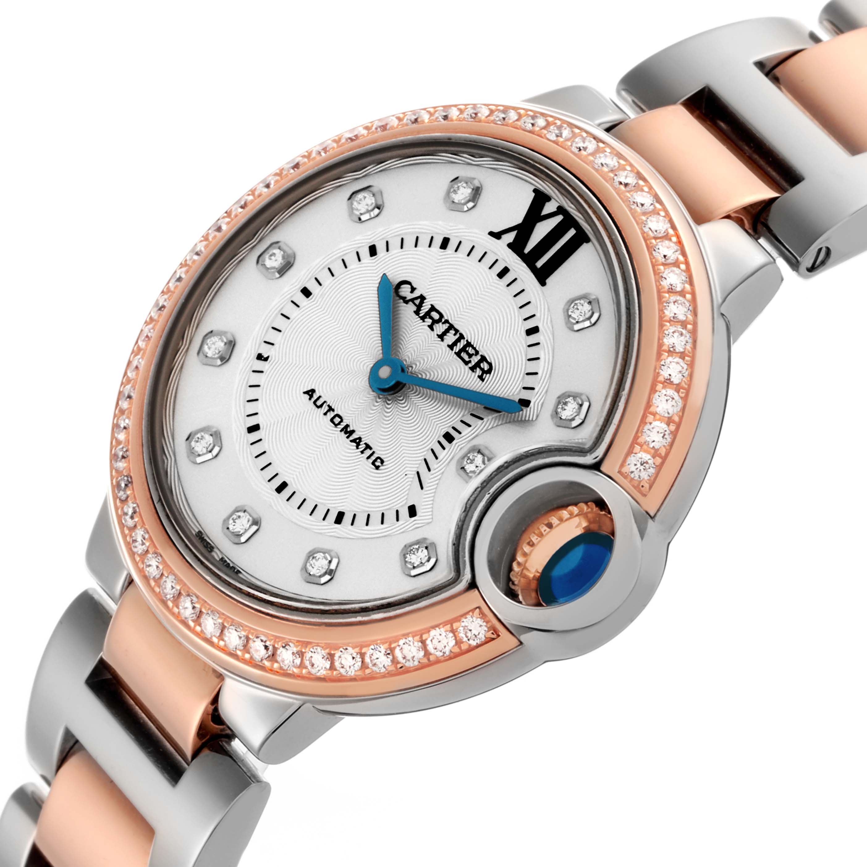 The Cartier Ballon Bleu WE902077 Women's Steel and Gold (two tone) Silver Dial WE902077 Women's Steel and Gold (two tone) Silver Dial watch is shown from a top angle, highlighting the face, bezel, and part of the bracelet.
