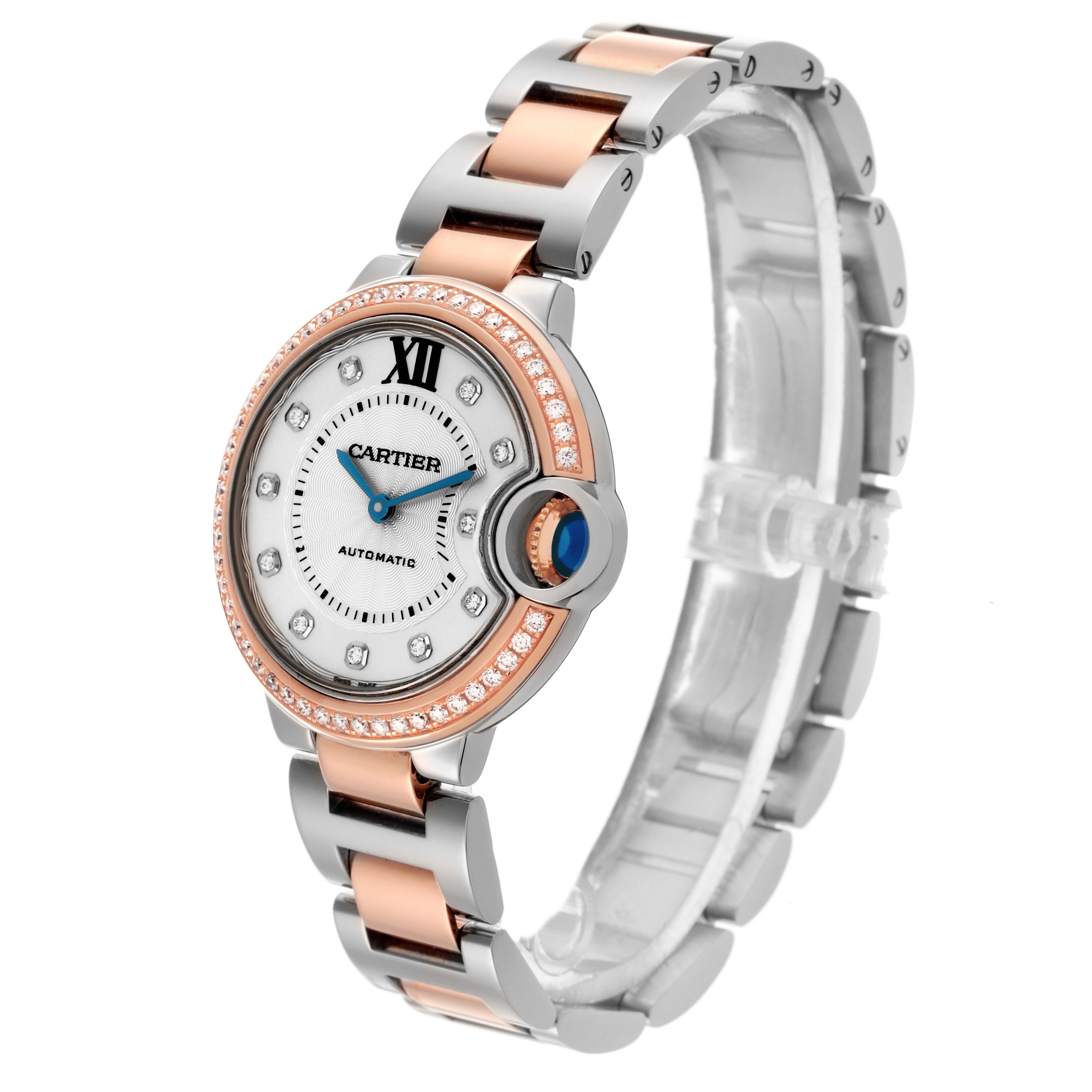 The Cartier Ballon Bleu WE902077 Women's Steel and Gold (two tone) Silver Dial WE902077 Women's Steel and Gold (two tone) Silver Dial watch is shown at an angle displaying the face, bezel, crown, and bracelet.