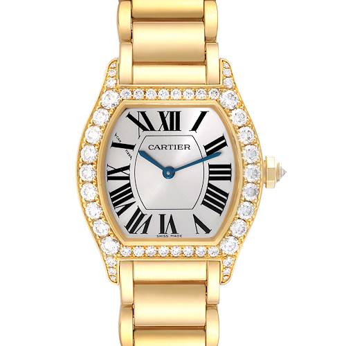 The image showcases a frontal view of the Cartier Tortue WA5071W8 Women's Yellow Gold Silver Dial WA5071W8 Women's Yellow Gold Silver Dial watch, highlighting its gold casing, diamond bezel, and bracelet.