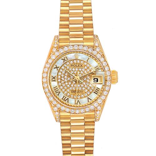 This image displays a Rolex President 69158 Women's Yellow Gold Mother of Pearl Dial 69158 Women's Yellow Gold Mother of Pearl Dial model watch with a gold bracelet, diamond-studded bezel, and dial, shown from a top-down angle.