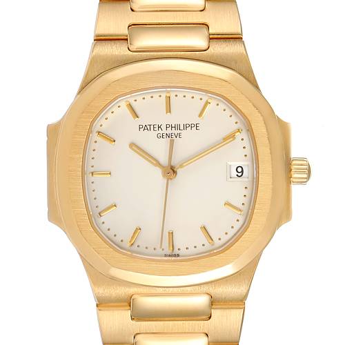 This image shows a front view of a Patek Philippe Nautilus 3900/1J Women's Yellow Gold Silver Dial 3900/1J Women's Yellow Gold Silver Dial watch, detailing the face, hands, date window, and part of the bracelet.