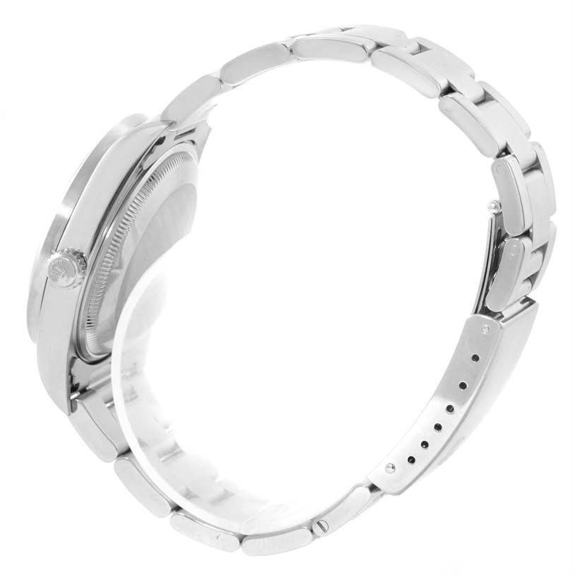 This image shows the side angle of the Rolex Date 15210 Men's Stainless Steel Silver Dial 15210 Men's Stainless Steel Silver Dial model watch, focusing on the case, crown, and bracelet.