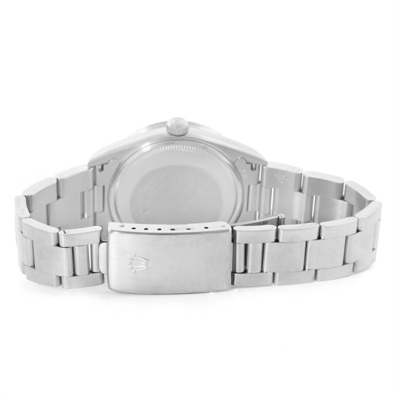 This image shows the back case and bracelet of a Rolex Date 15210 Men's Stainless Steel Silver Dial 15210 Men's Stainless Steel Silver Dial model watch, viewed from a rear angle.