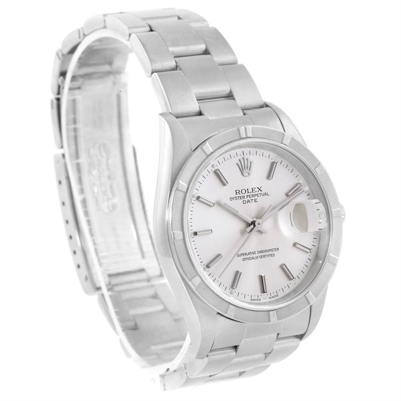 The image shows a Rolex Oyster Perpetual Date model at a front-side angle, highlighting the dial, bracelet, and date magnifier.