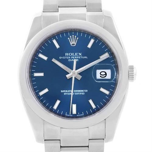 The image shows a front view of a Rolex Date 115200 Men's Stainless Steel Blue Dial 115200 Men's Stainless Steel Blue Dial model watch, displaying its blue dial, hour markers, hands, and date window with a magnifier.