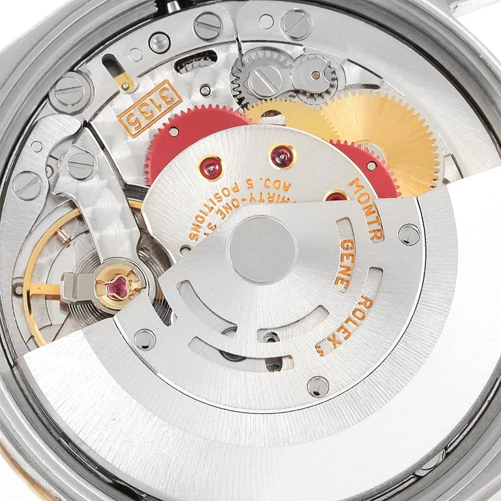 The image shows the internal mechanism and movement of the Rolex Date 15223 Men's Steel and Gold (two tone) White Dial 15223 Men's Steel and Gold (two tone) White Dial model watch from a close-up angle.