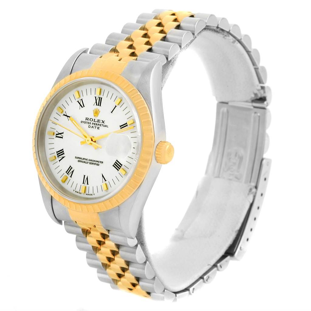 This Rolex Date 15223 Men's Steel and Gold (two tone) White Dial 15223 Men's Steel and Gold (two tone) White Dial watch is shown in a side angle, highlighting its dial, bezel, and two-tone bracelet.