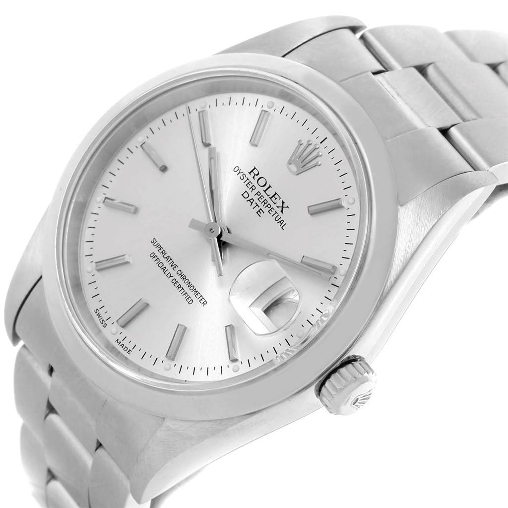 This image shows an angled view of a Rolex Oyster Perpetual Date watch, focusing on the dial, bezel, and part of the bracelet.