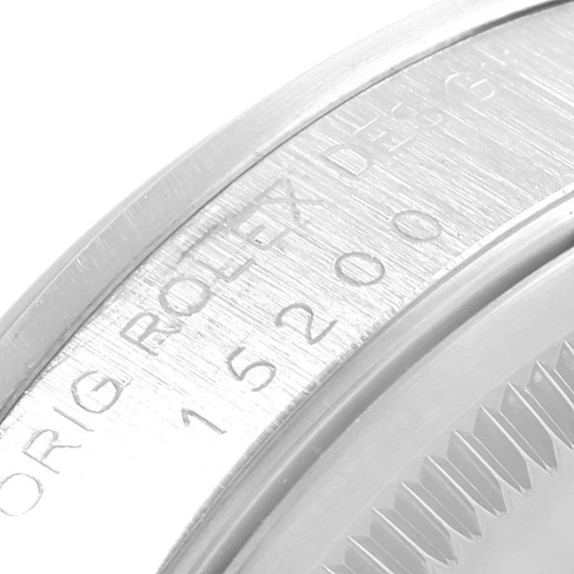 This image shows a close-up of the engraved reference number and brand name inside the case of a Rolex Date 15200 Men's Stainless Steel Silver Dial 15200 Men's Stainless Steel Silver Dial model 15200.