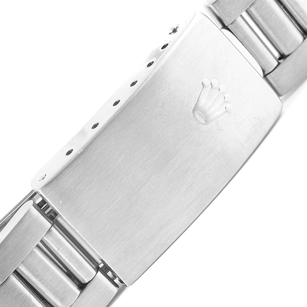 This image shows a close-up of the clasp on a Rolex Date 15200 Men's Stainless Steel Silver Dial 15200 Men's Stainless Steel Silver Dial model watch, featuring the Rolex logo.