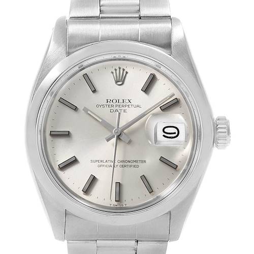 This image shows a close-up, front view of a Rolex Oyster Perpetual Date watch, focusing on its dial and bezel.