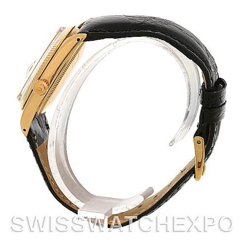 The image shows a side view of a Rolex Date 1503 Men's Yellow Gold Champagne Dial 1503 Men's Yellow Gold Champagne Dial model watch featuring the case side and strap.