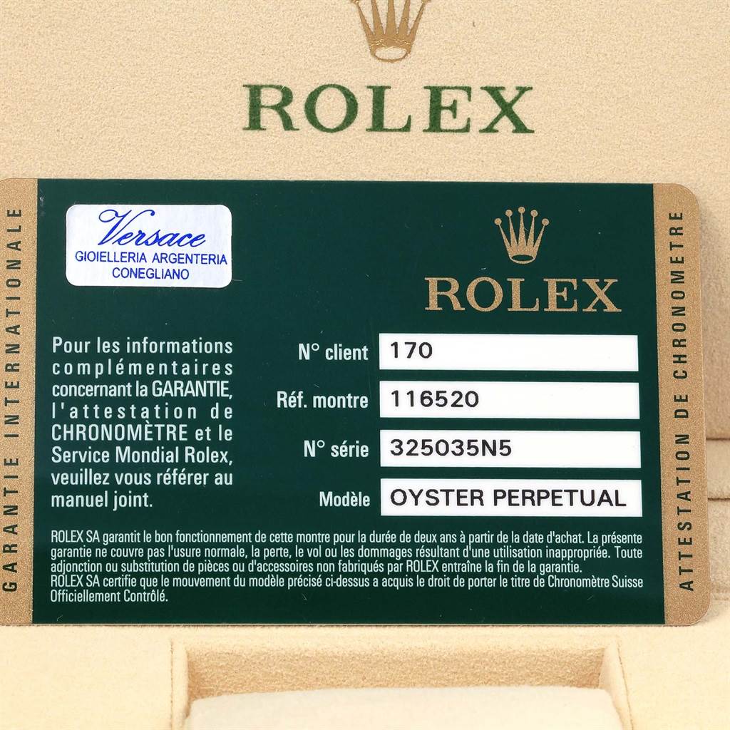 The image shows a warranty card for a Rolex Daytona 116520 Men's Stainless Steel White Dial 116520 Men's Stainless Steel White Dial model watch with reference number 116520 and serial number 325035N5.