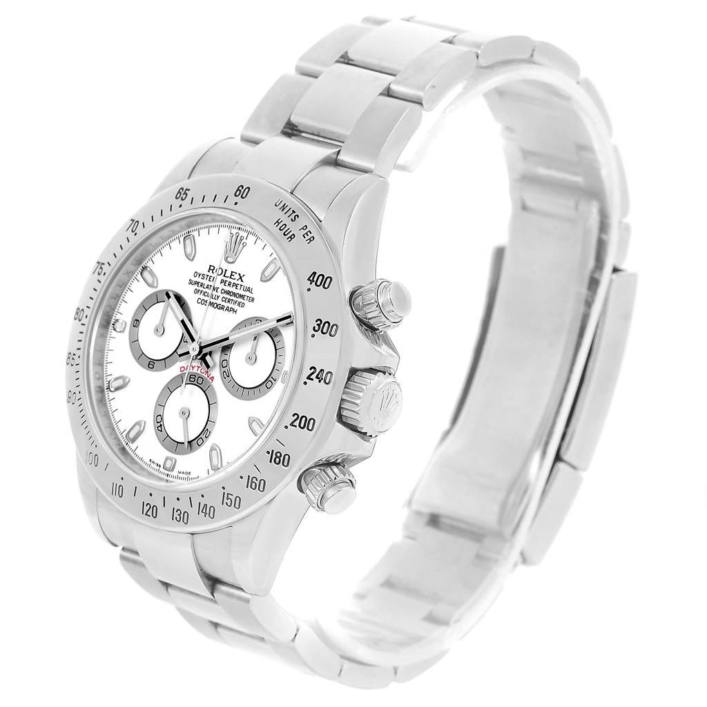 The image shows a Rolex Daytona 116520 Men's Stainless Steel White Dial 116520 Men's Stainless Steel White Dial watch at a three-quarter angle, highlighting the face, bezel, pushers, and part of the bracelet.