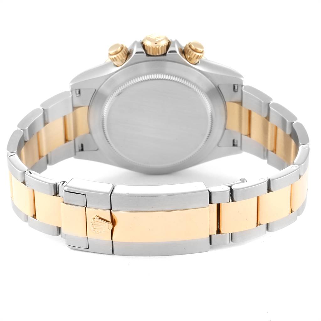 This image shows the back view of a Rolex Daytona 116523 Men's Steel and Gold (two tone) Black Dial 116523 Men's Steel and Gold (two tone) Black Dial watch, focusing on its stainless steel and gold bracelet and clasp.