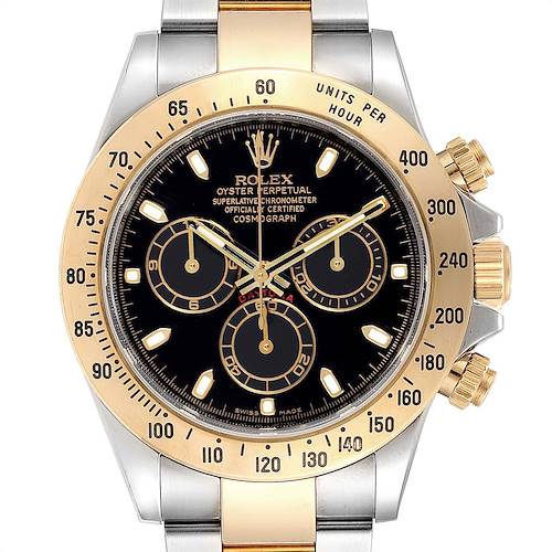 The image shows a front view of a Rolex Daytona 116523 Men's Steel and Gold (two tone) Black Dial 116523 Men's Steel and Gold (two tone) Black Dial watch, highlighting the dial, bezel, and pushers.