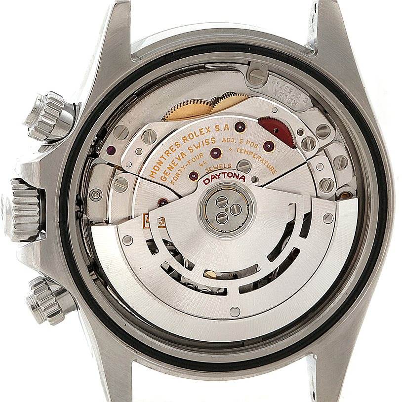 The image shows the back view of a Rolex Daytona 116520 Men's Stainless Steel White Dial 116520 Men's Stainless Steel White Dial watch, highlighting its intricate movement and internal components.