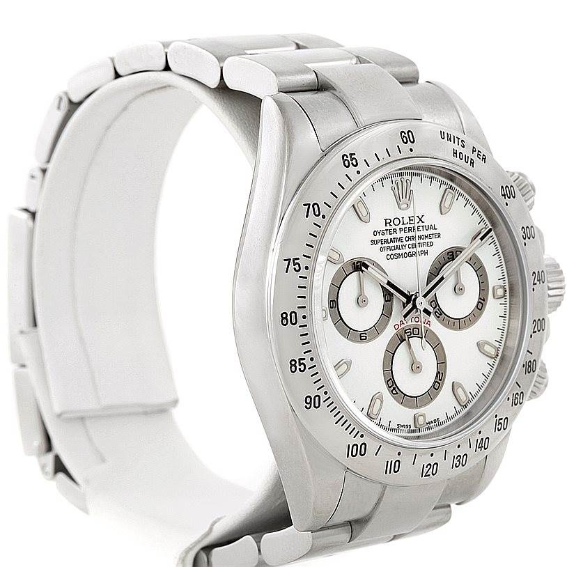The Rolex Daytona 116520 Men's Stainless Steel White Dial 116520 Men's Stainless Steel White Dial watch is shown at an angled side view, displaying part of the bracelet, face, and side crown.