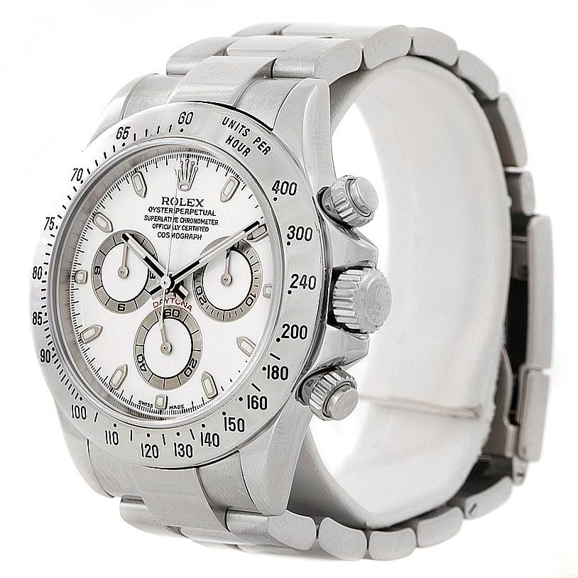 The image shows a Rolex Daytona 116520 Men's Stainless Steel White Dial 116520 Men's Stainless Steel White Dial watch from a three-quarter angle, highlighting the dial, bezel, crown, and bracelet.