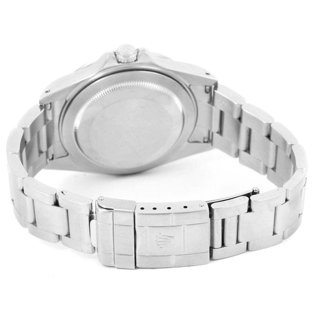 The image shows the back view of a Rolex Explorer 16570 Men's Stainless Steel Black Dial 16570 Men's Stainless Steel Black Dial model watch, highlighting its bracelet, clasp, and case back.