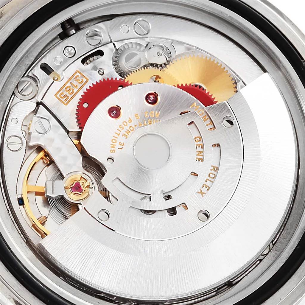 This image shows the back view of the Rolex Explorer 16570 Men's Stainless Steel Black Dial 16570 Men's Stainless Steel Black Dial's movement, featuring various gears and the rotor.