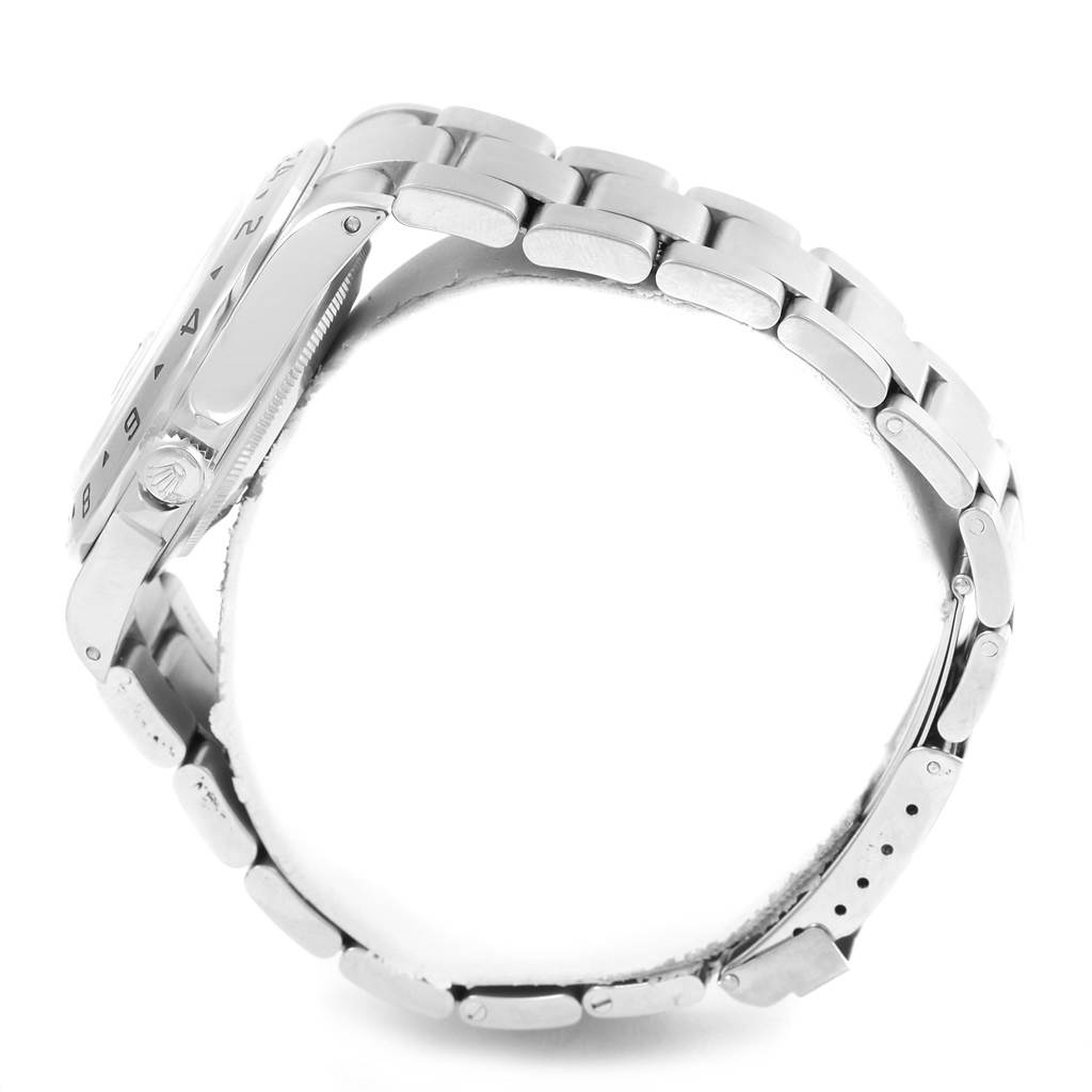 This image shows a side view of a Rolex Explorer 16570 Men's Stainless Steel Black Dial 16570 Men's Stainless Steel Black Dial watch, highlighting the bracelet, case, crown, and bezel markings.