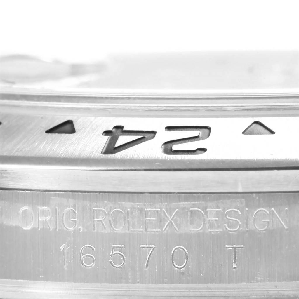 This close-up angle shows the engraved bezel and reference number "16570" of the Rolex Explorer 16570 Men's Stainless Steel Black Dial 16570 Men's Stainless Steel Black Dial watch.