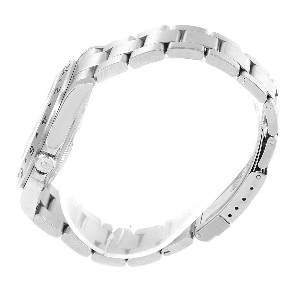 The image shows the Rolex Explorer 16570 Men's Stainless Steel White Dial 16570 Men's Stainless Steel White Dial watch from a side angle, highlighting the bezel, crown, and metal bracelet.