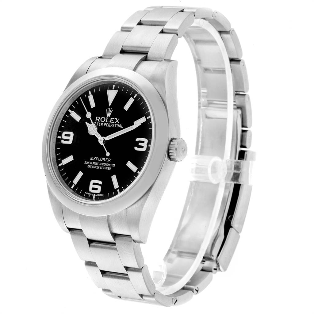 The Rolex Explorer 214270 Men's Stainless Steel Black Dial 214270 Men's Stainless Steel Black Dial watch is shown at a front-left angle, displaying the dial, bezel, crown, and metal bracelet.