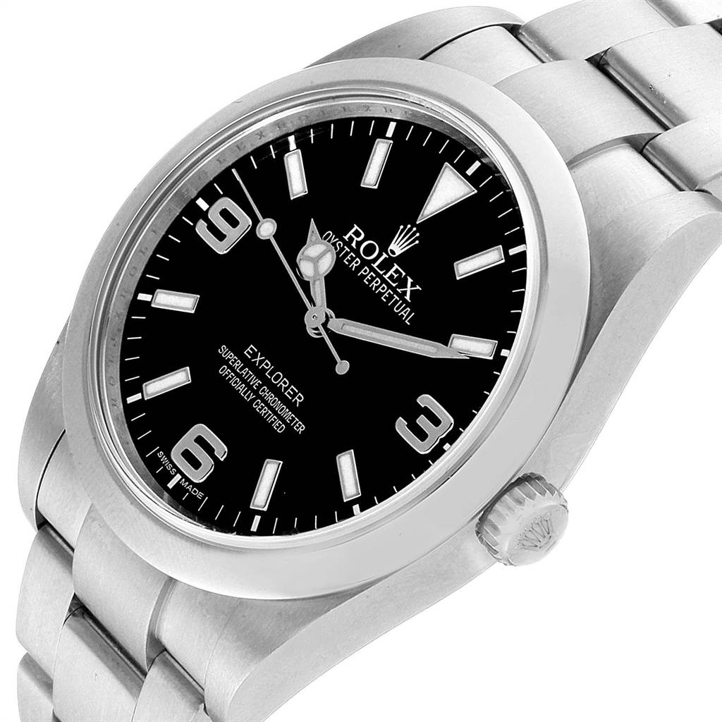 The image shows a Rolex Explorer 214270 Men's Stainless Steel Black Dial 214270 Men's Stainless Steel Black Dial watch at an angled close-up, highlighting the black dial, crown, and stainless steel bracelet.