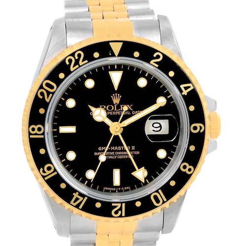 The image shows a front view of a Rolex GMT-Master 16713 Men's Stainless Steel Black Dial 16713 Men's Stainless Steel Black Dial II watch, highlighting its black dial, gold bezel, and two-tone bracelet.