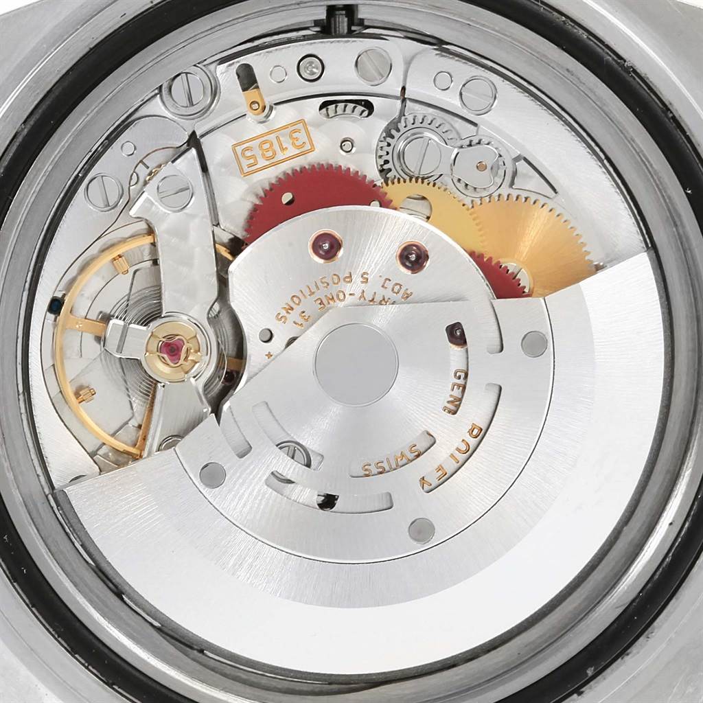 This image shows the inner mechanical parts of a Rolex GMT-Master 16710 Men's Stainless Steel Black Dial 16710 Men's Stainless Steel Black Dial watch from a direct, close-up angle.