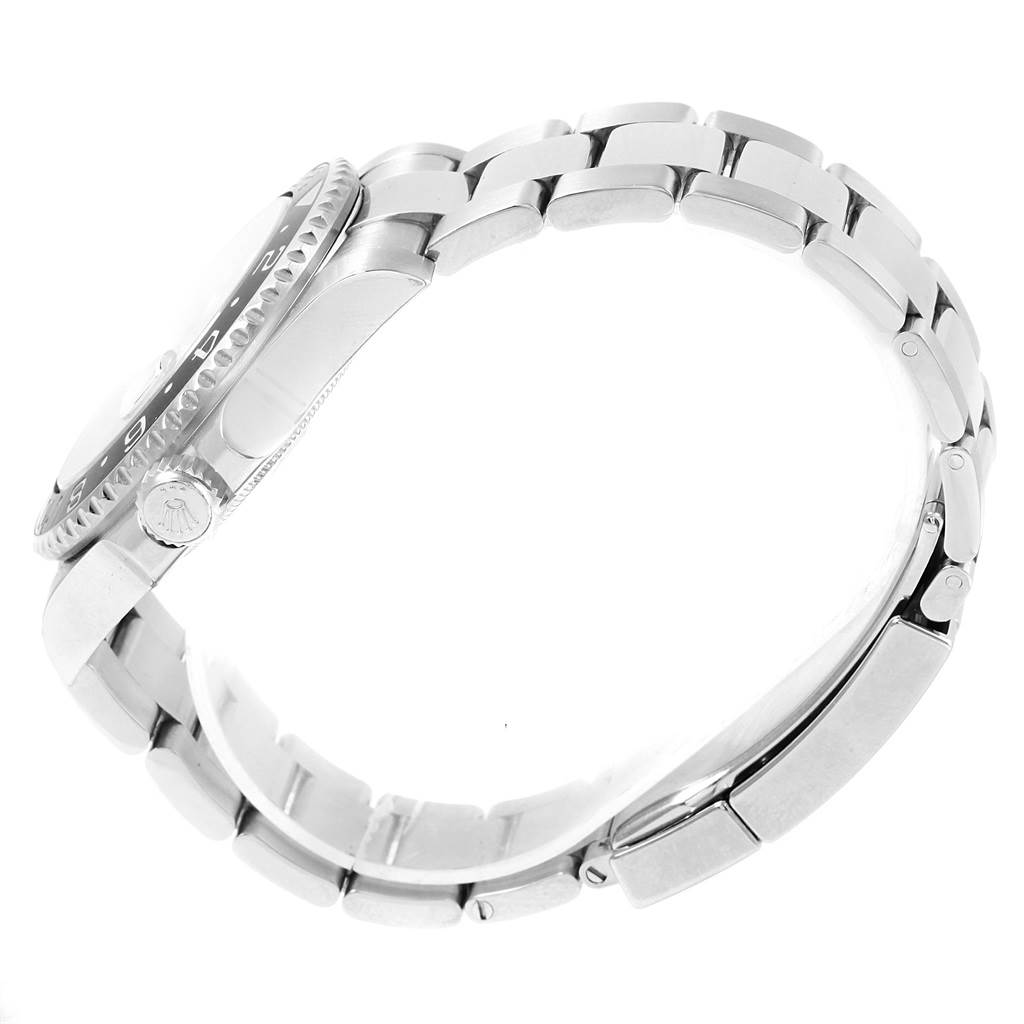 The image shows a side view of a Rolex GMT-Master 116710 Men's Stainless Steel Black Dial 116710 Men's Stainless Steel Black Dial, highlighting its bezel, crown, and bracelet.