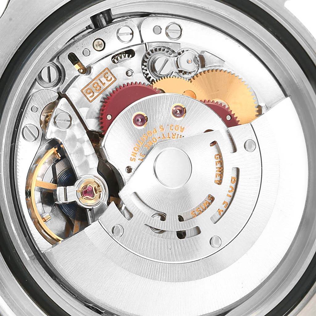 This image shows the intricate internal movement components of a Rolex GMT-Master 116710 Men's Stainless Steel Black Dial 116710 Men's Stainless Steel Black Dial watch from a top-down perspective.