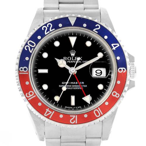 The image shows a front view of a Rolex GMT-Master 16700 Men's Stainless Steel Black Dial 16700 Men's Stainless Steel Black Dial watch, featuring a red and blue bezel and a date window at 3 o'clock.