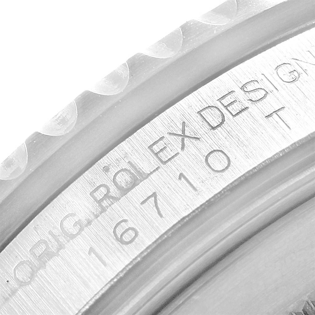 This close-up image shows the engraved model number and brand name on the case of the Rolex GMT-Master 16710 Men's Stainless Steel Black Dial 16710 Men's Stainless Steel Black Dial.