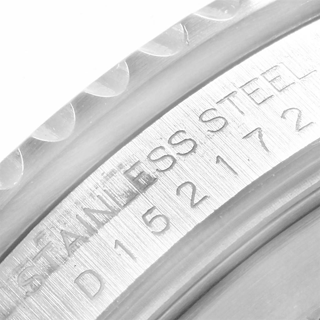 This close-up image shows the engraved serial number and "STAINLESS STEEL" on the side of a Rolex GMT-Master 16710 Men's Stainless Steel Black Dial 16710 Men's Stainless Steel Black Dial watch.